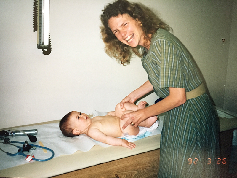 Dr. Congdon with an infant patient